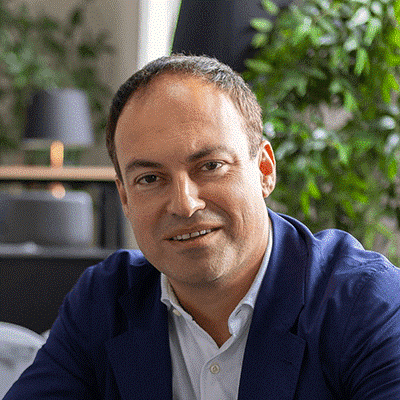 Headshot of Aaron Etingen, Executive Chairman and Chief Executive Officer of Global University Systems.