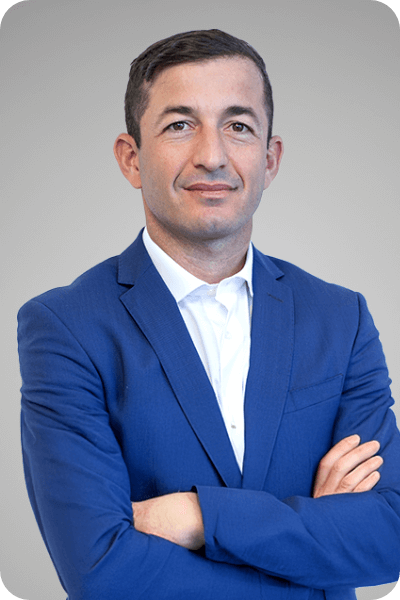 Headshot of Elad Rachevsky, Chief Investment Officer at Global University Systems.