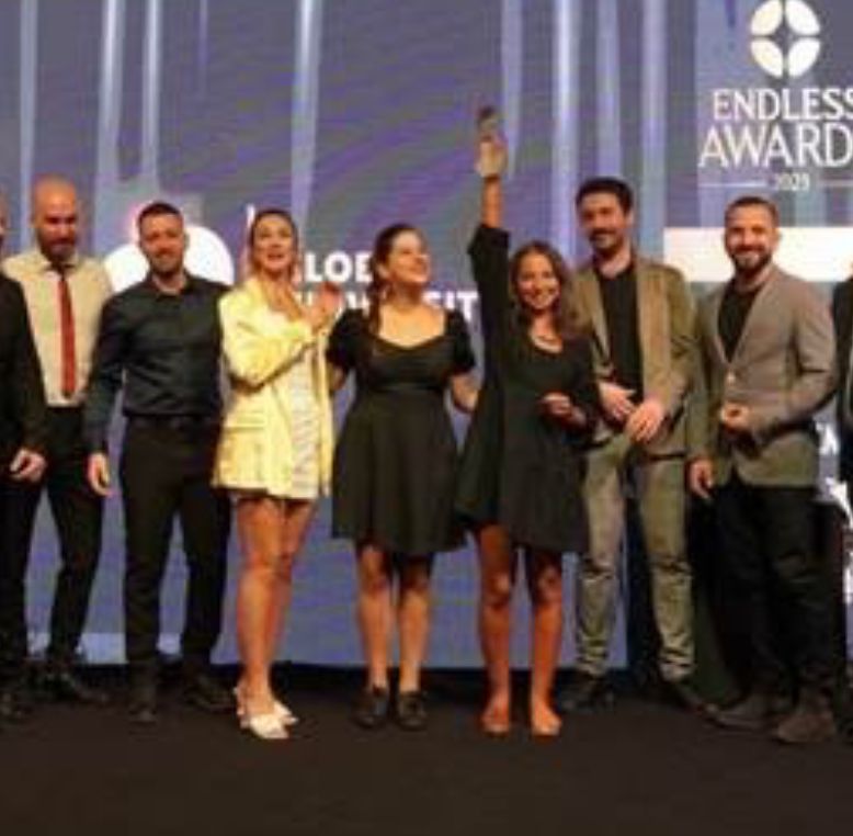 Group of people receiving the Abroad Social Impact Award