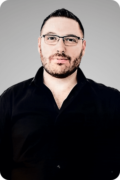 Headshot of Max Etingen, Chief Commercial Officer at Global University Systems