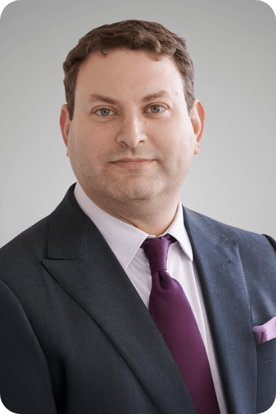 Headshot of Sagi Hartov, Chief Executive officer of Global University Systems Germany