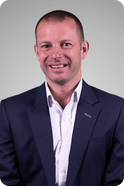 Headshot of Will Major, Chief Transformation officer at Global University Systems.