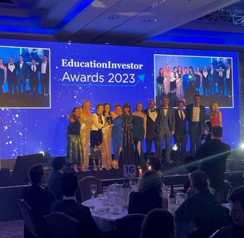 Arden University receiving the EducationInvestor Awards 2023
