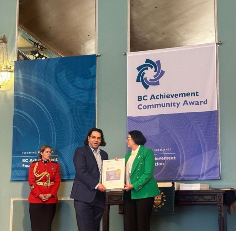 The Honourable Janet Austin, OBC, Lieutenant Governor of British Columbia, presenting the 2024 BC Community Award to Troy MacBeth Abromaitis, Senior Development Manager at Musqueam Capital Corporation and Indigenous Advisor to University Canada West, during the 21st Annual Community Award ceremony held at Government House in Victoria.