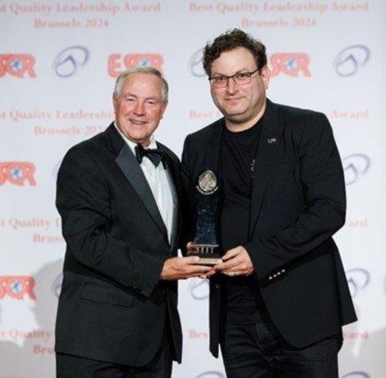 Sagi Hartov, Co-Founder and EC of BSBI and CEO of GUS Germany being presented with the award.