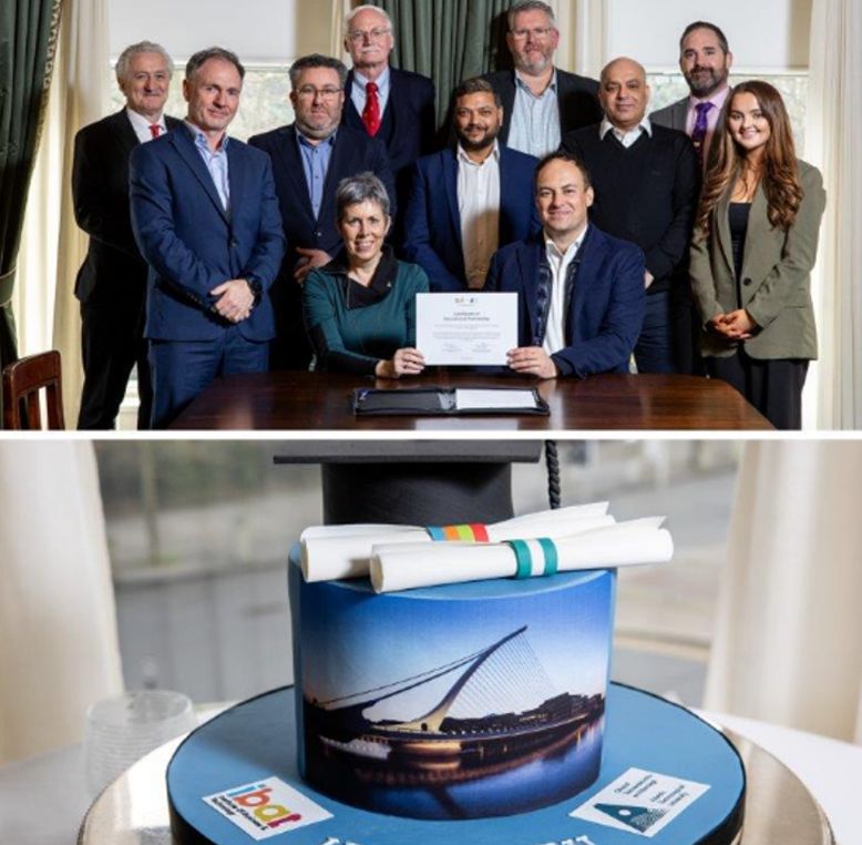 Group of professional smiling and posing for a picture.