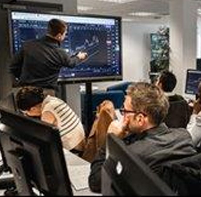 Trading class in session at the London Academy of Trading.