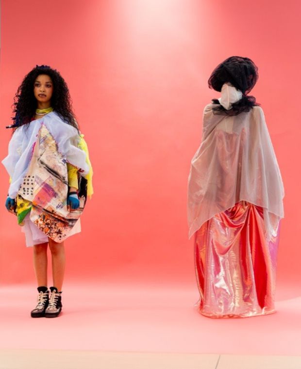 LCCA students modeling on a fashion runway, showcasing their designs or participating in a fashion event.