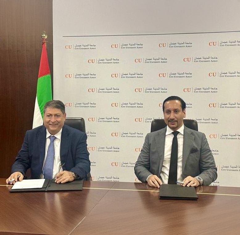 Dr. Bashir Makhoul, President and Vice-Chancellor of University Canada West, signing a Memorandum of Understanding with Dr. Imran Khan, President of City University Ajman, marking a new partnership between the two institutions.