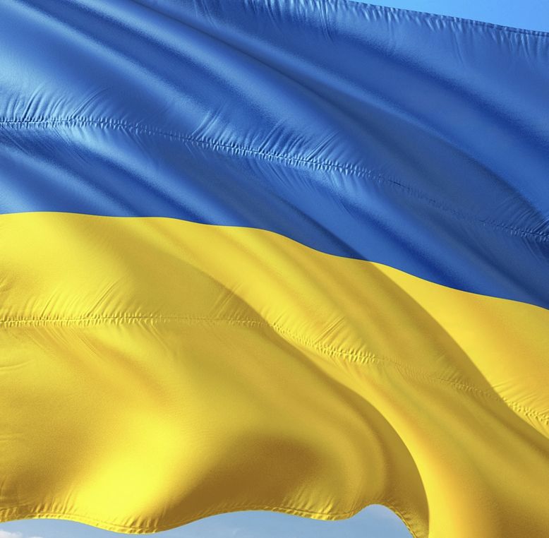 Ukrainian flag waving, showing blue and yellow horizontal bands.