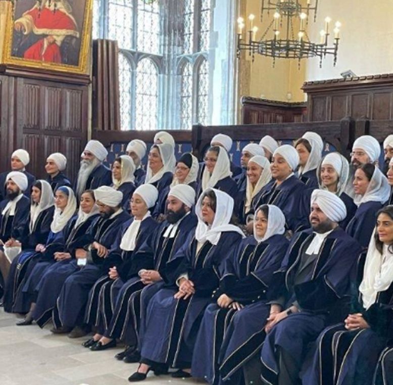 A courtroom filled with attendees during the swearing-in ceremony for the UK Sikh Court at The Honourable Society of Lincoln's Inn.