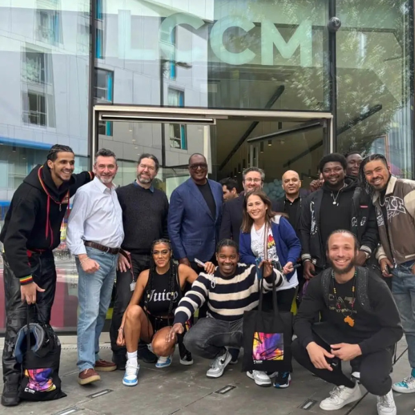 Dr Mathew Knowles and a group of students outside LCCM campus.