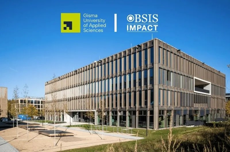 Campus building of Gisma University of Applied Sciences with BSIS Impact logo.