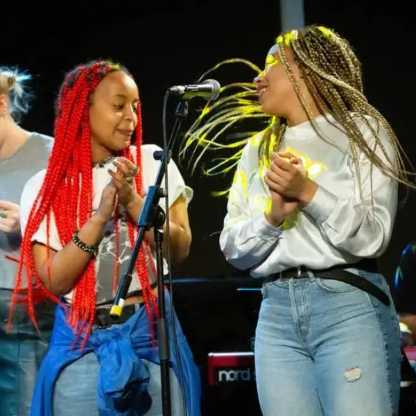 LCCM students performing on a stage