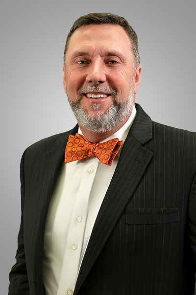 A headshot of Ward Ulmer, Chief Executive Officer, Healthcare, North America.