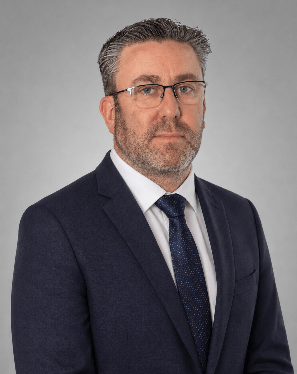 a man wearing a suit and tie